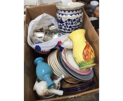 A box of mixed ceramics including plates, cups and saucers and jugs etc. Also includes a cast Lakeland hand operated mincer 
