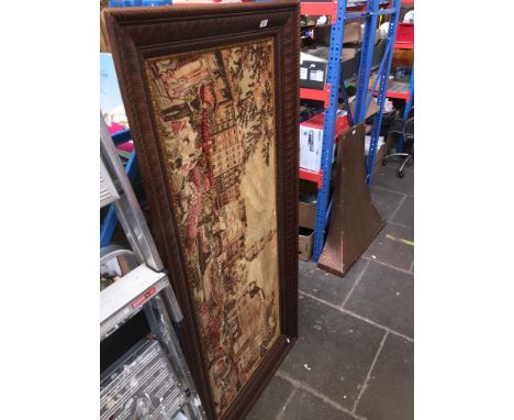 A large framed tapestry of Amsterdam 