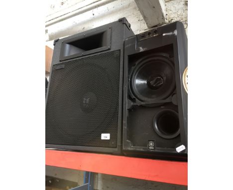 A pair of TOA speakers, model number SL150 and a Yamaha YST ST90 subwoofer. 
