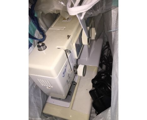 A Joy's Arts and Crafts model PF1000 sewing machine 
