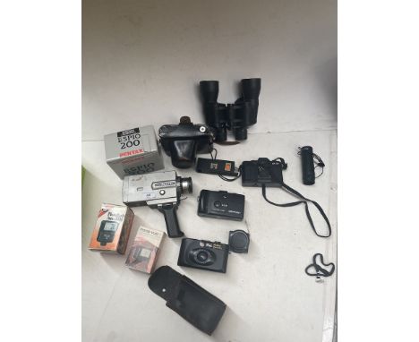 A box of cameras and related items to include Zenit, Pentax, a pair of binoculars, a Super 8 cine camera, etc. 