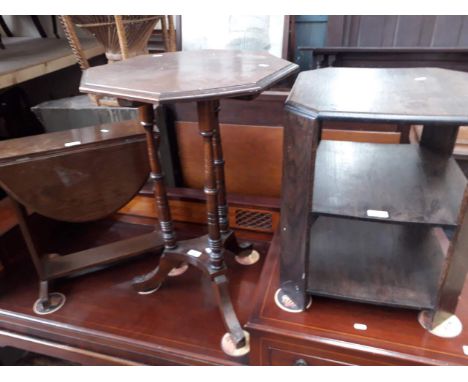 An octagonal top tripod table, an oak two tier table and an oak drop leaf table. 