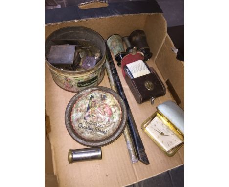 A mixed box including vintage brass primus stove, Tempora travel alarm clock, 2 penny whistles, Gossen color finder etc 