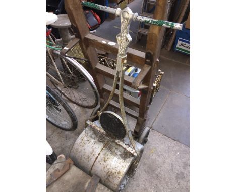 A garden roller - roller seized up / doesn't roll. 