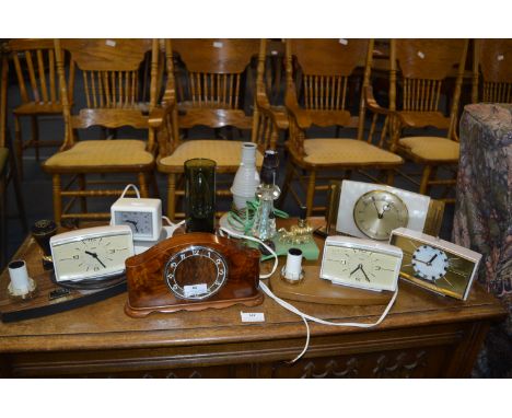 Four Vintage Metamec Clocks and a Mantel Clock 