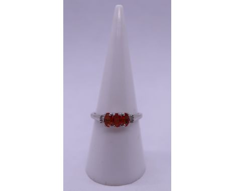 Silver orange sapphire set ring - Size N 