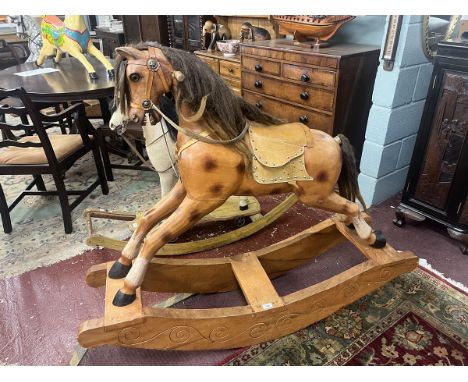 Carved wooden rocking horse 