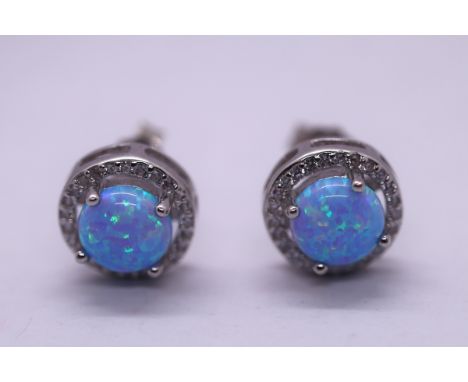 Pair of silver opal set earrings 