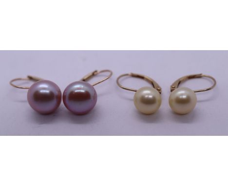 2 pairs of gold pearl set earrings 