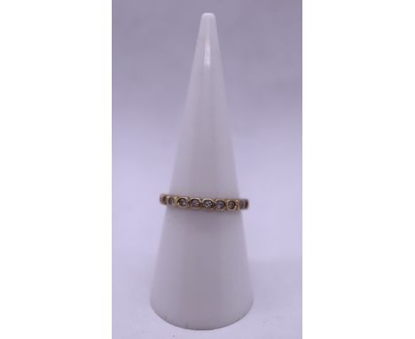 14ct gold stone set eternity ring 