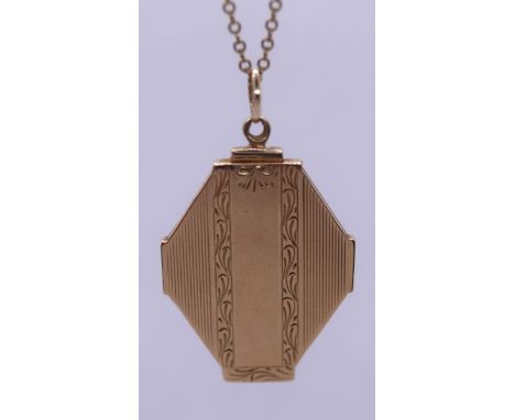 9ct gold locket on 14ct rolled gold chain - Approx weight of locket 8g 