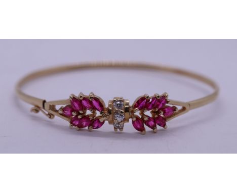 10ct gold ruby & white sapphire set bangle 