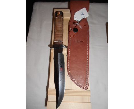 A new 'Hattori' limited edition 1 of 20 hunting knife with leather scabbard housed in a pine box