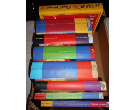 J.K. ROWLING the full set of 'Harry Potter' volumes, I and II paperbacks, III - VII first edition hardbacks (III first editio