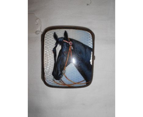 An early 20th C 900 standard silver cigarette case, the enamel front decorated with a horse's head