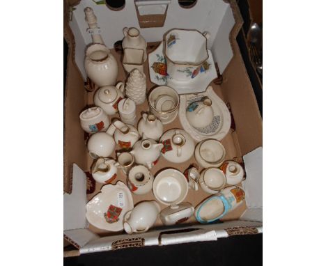 A collection of Victorian and later crested-ware to include a 1887 Jubilee cup and saucer, a light house, horse shoe, pine co
