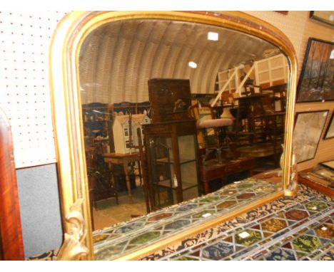 A Victorian chequered strung rosewood over mantel mirror 