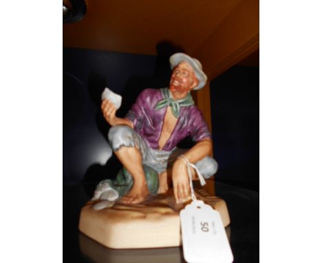 A Royal Doulton bisque porcelain figure 'The Beachcomber' HN2487