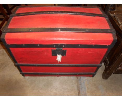 An early 20th C painted metal bound dome top trunk with interior trug