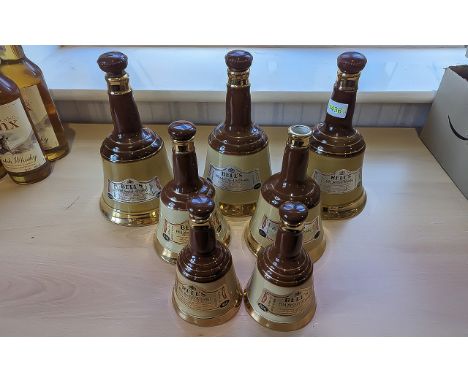 Seven Bells Scotch Whisky Decanters, assorted sizes, without contents, all marked Wade and Perth, Scotland.