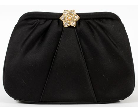 JUDITH LEIBER BLACK SATIN EVENING BAG WITH  JEWELED CLASP, W 7 1/2":  A black satin bag with  floriform clasp opening to an i