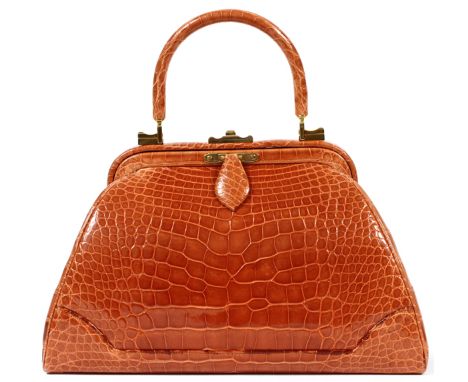 JUDITH LEIBER BROWN ALLIGATOR BAG, W 11'':   Cognac brown alligator bag with top handle and  optional shoulder strap.  Includ