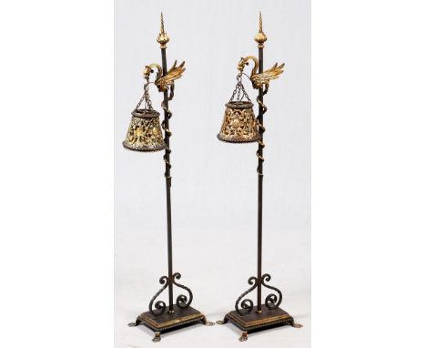 LATE VICTORIAN CAST IRON GRIFFIN ELECTRIFIED  HEARTH LAMPS, C. 1900, PAIR, H 51":  having  tubular metal center shafts with a