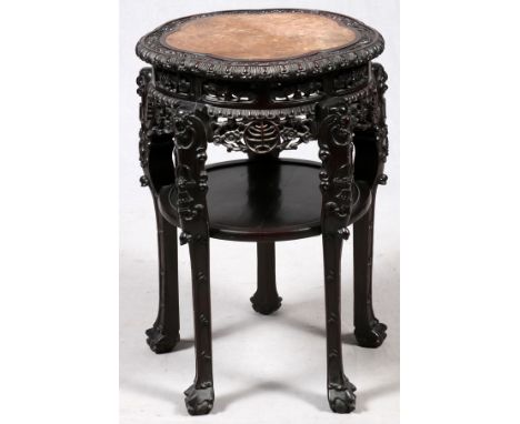 CHINESE TEAKWOOD TABLE, 19TH CEN, H 33'', DIA  21'':  Heavily carved and pieced . Shelf  stretcher. Red marble. 