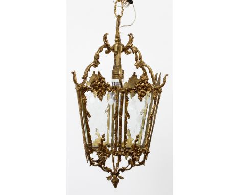HEXAGONAL BRASS HANGING LAMP, H 21", DIA 11.5":   A Spanish style brass hanging lamp, having  etched glass panels and suspend