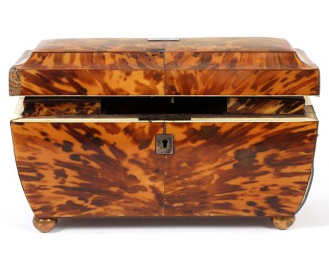 ENGLISH GEORGIAN TORTOISE TEA CADDY, EARLY 19TH  C., H 7'', W 10 3/4'':  Tortoise and ivory  veneer English tea caddy.  Hinge