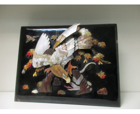 An early 20th century photograph album with inlaid black lacquer cover, containing 1930-40 photographs of Japan, Shanghai, an