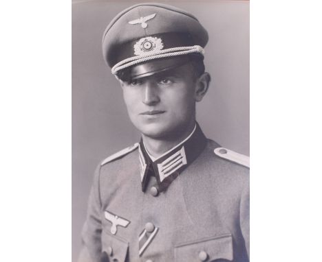Collection of Framed German Military Photographs, one colour tinted, and one award document (possibly re-print), 