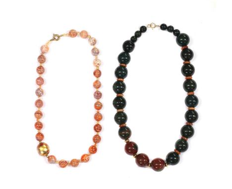 A bloodstone bead necklace, with agate beads and gold spacer beads to the front, to bloodstone beads with jade spacer beads, 