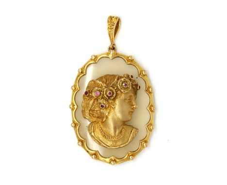A 9ct gold ruby and chalcedony composite cameo pendant, a gold profile of a lady with round mixed cut rubies, some probably s