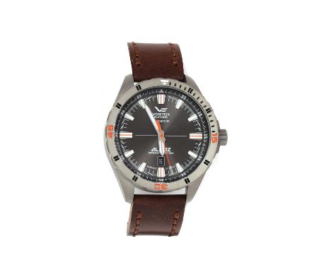 A cased titanium Vostok 'Almaz Space Station' automatic strap watch,47mm diameter with a grey dial, luminous baton hour marke