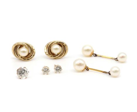 A pair of gold cultured pearl drop earrings, with a cultured pearl, peg set, with a smaller cultured pearl cup set above, joi