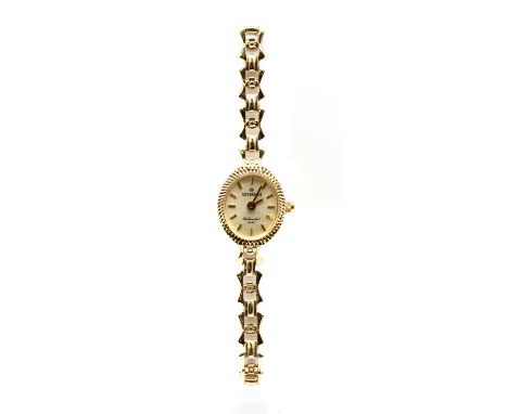 A ladies' 9ct gold Sovereign quartz bracelet watch, with a silvered dial and baton hour markers, to link bracelet and ladder 