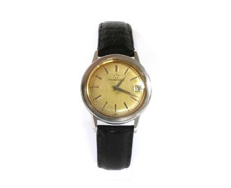 A gentlemen's stainless steel Eterna 'Eternamatic' automatic strap watch, 35mm diameter, with a brushed champagne dial, baton