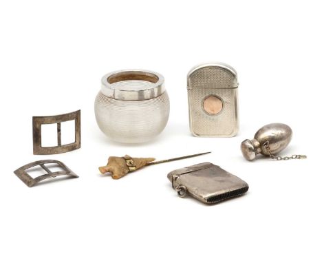 A small collection of silver, comprising two sterling silver vesta cases, a pair of sterling silver buckles, a sterling silve