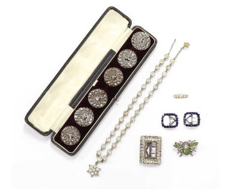 A cased set of cut steel buttons, together with a Georgian silver paste set buckle, a silver paste set bee brooch with later 