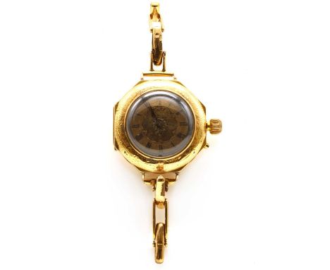 A gold pin-set bracelet watch, probably later converted from a fob watch, with an octagonal case and gilt dial with black Rom