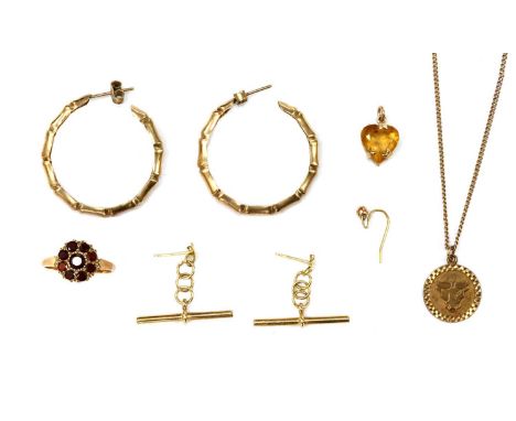 A collection of gold jewellery, comprising a pair of gold bamboo hoop earrings with post and butterfly fittings, a pair of go