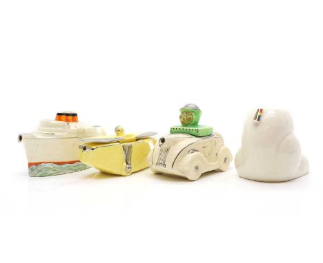 A group of three Art Deco novelty porcelain teapots, comprising a plane, a car and an ocean liner, the largest 24cm wide;toge