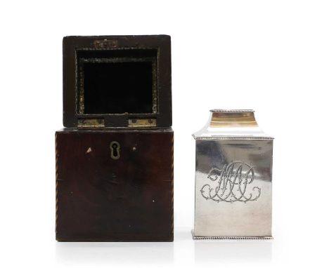 A George III silver tea caddy, by Thomas Justis, London 1771, monogrammed, in a fitted mahogany and velvet lined case, with c