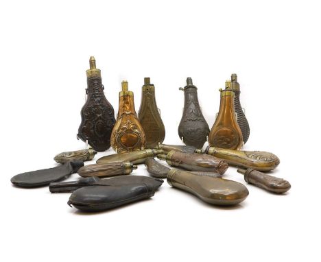 A collection of copper powder and shot flasks,  embossed decoration including Hawkesley, Dixon and Continental examples, leat