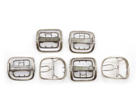 Three pairs of George III silver shoe buckles comprising;a pair by William Eley, London 1791, with reeded decoration, the pin