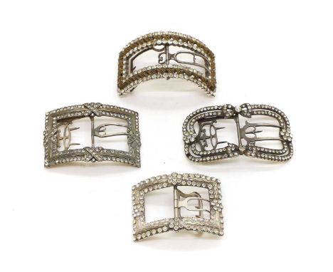 A group of four shoe buckles late 18th to early 19th century, possibly French, each of rectangular form, with cut paste stone