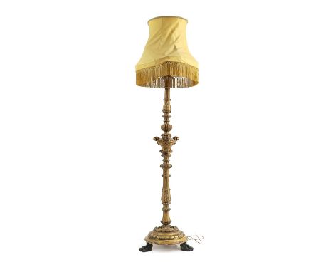 A carved and gilt standard lamp, late 19th century, with a tasselled shade, raised on painted claw feet, 213cm highCondition 