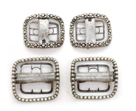 Two pairs of Eley type silver shoe buckles comprising;a pair by William Eley,London 1794, stamped 'Eleys Patent 21821', with 