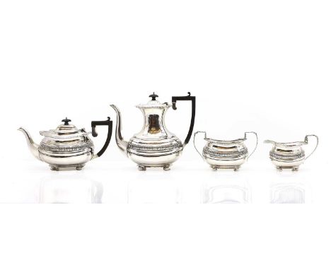 A four piece silver tea and coffee service by George Nathan &amp; Ridley Hayes, Chester 1902, comprising a coffee pot, 23.5cm